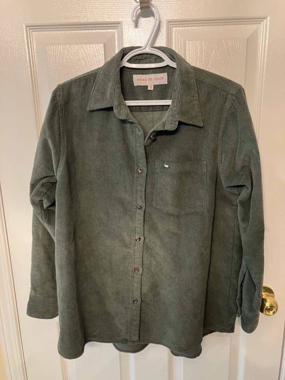Green corduroy shirt by Peau de Loup (Size 12)